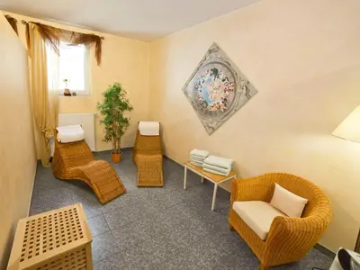 Ein Sitzbereich in der Unterkunft Fairway Hotel