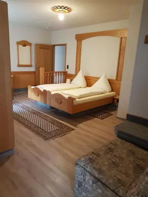 Ein Bett oder Betten in einem Zimmer der Unterkunft Hotel Paelzer Buwe