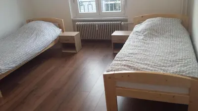 Ein Bett oder Betten in einem Zimmer der Unterkunft Ferienwohnung Scholl