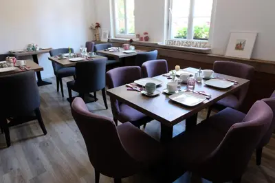 Ein Sitzbereich in der Unterkunft Gästehaus zur Sonne
