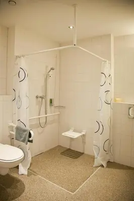 Ein Badezimmer in der Unterkunft business & conference Sporthotel Großwallstadt