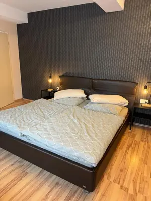 Ein Bett oder Betten in einem Zimmer der Unterkunft Ferienwohnung Gisela