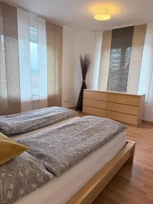 Ein Bett oder Betten in einem Zimmer der Unterkunft Komfort Apartment D&D Spessart perfekt für Arbeit & Erholung
