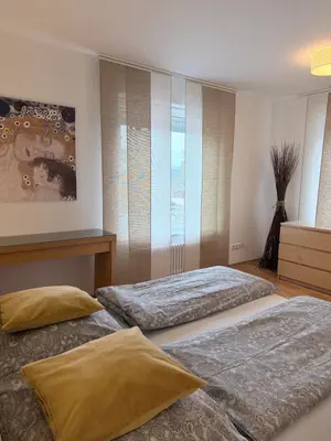 Ein Bett oder Betten in einem Zimmer der Unterkunft Komfort Apartment D&D Spessart perfekt für Arbeit & Erholung