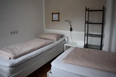 Ein Bett oder Betten in einem Zimmer der Unterkunft Ferienwohnung auf dem Dorf, Külsheim
