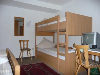 Ein Bett oder Betten in einem Zimmer der Unterkunft Wengerterstube & Gästezimmer Kern
