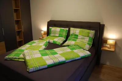 Ein Bett oder Betten in einem Zimmer der Unterkunft Boardinghouse-Niedernberg