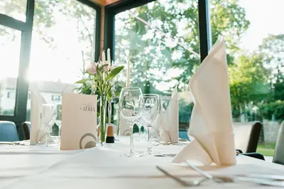Ein Restaurant oder anderes Speiselokal in der Unterkunft Hotel Schloss Lehen