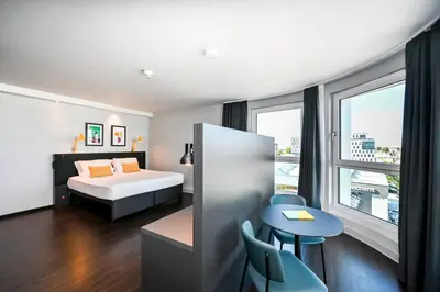 Ein Bett oder Betten in einem Zimmer der Unterkunft Staycity Aparthotels Heidelberg