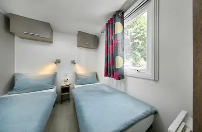 Ein Bett oder Betten in einem Zimmer der Unterkunft KNAUS Campingpark Bad Dürkheim