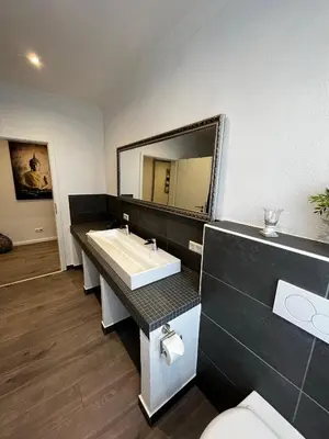 Ein Badezimmer in der Unterkunft Residenz Royal