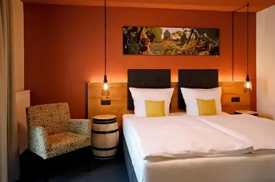 Ein Bett oder Betten in einem Zimmer der Unterkunft Casa Palatina Vinotel