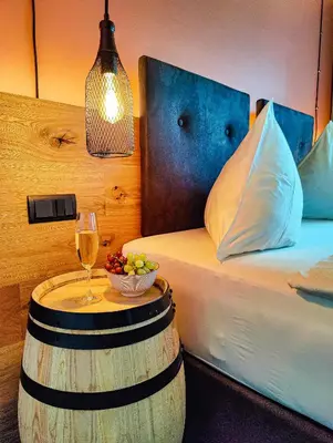 Ein Bett oder Betten in einem Zimmer der Unterkunft Casa Palatina Vinotel