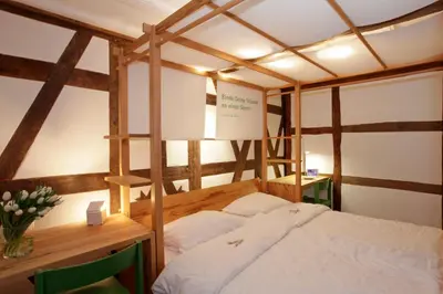 Ein Bett oder Betten in einem Zimmer der Unterkunft Mühle am Schlossberg