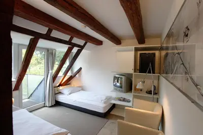 Ein Bett oder Betten in einem Zimmer der Unterkunft Mühle am Schlossberg