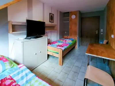 Ein Bett oder Betten in einem Zimmer der Unterkunft Bea's Monteurzimmer