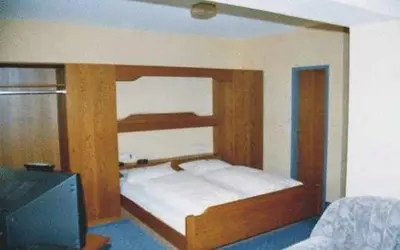 Ein Bett oder Betten in einem Zimmer der Unterkunft Hotel Ludwigstal