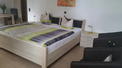 Ein Bett oder Betten in einem Zimmer der Unterkunft Winzerhof Spengler