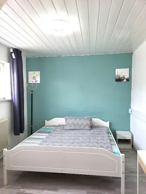 Ein Bett oder Betten in einem Zimmer der Unterkunft Charlotte House Heidelberg