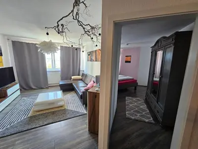 Ein Bett oder Betten in einem Zimmer der Unterkunft Deluxapartment