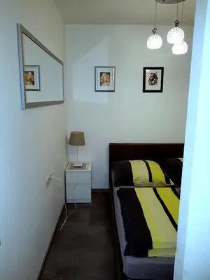 Ein Bett oder Betten in einem Zimmer der Unterkunft Alissa