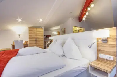 Ein Bett oder Betten in einem Zimmer der Unterkunft Hotel Jakob