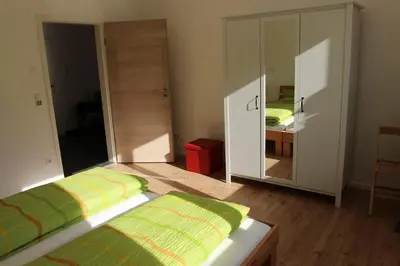 Ein Bett oder Betten in einem Zimmer der Unterkunft Fewo Max und Moritz