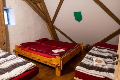 Ein Bett oder Betten in einem Zimmer der Unterkunft Zum Alten Marstall - Eventscheune für Gruppen tagen - feiern - übernachten