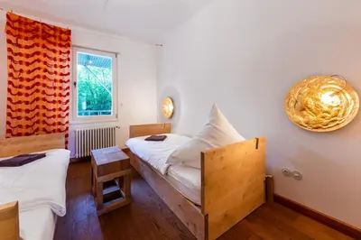Ein Bett oder Betten in einem Zimmer der Unterkunft Gruppenhaus Darmstadt