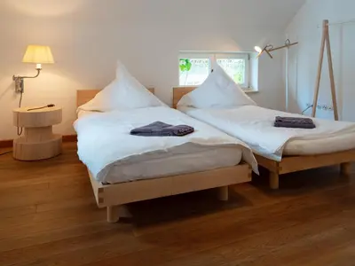 Ein Bett oder Betten in einem Zimmer der Unterkunft Gruppenhaus Darmstadt
