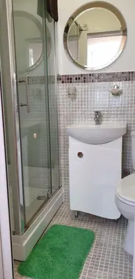 Ein Badezimmer in der Unterkunft Pension Haus Baron 1 Neckarau