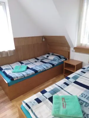 Ein Bett oder Betten in einem Zimmer der Unterkunft Pension Haus Baron 1 Neckarau