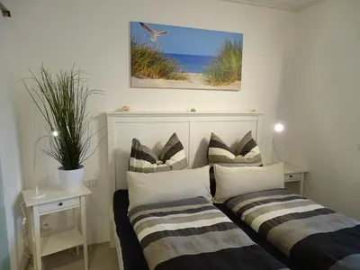 Ein Bett oder Betten in einem Zimmer der Unterkunft Apartwohnen