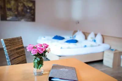 Ein Bett oder Betten in einem Zimmer der Unterkunft Weingut und Gästehaus Wetzler