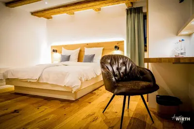 Ein Bett oder Betten in einem Zimmer der Unterkunft Hotel Am Markt