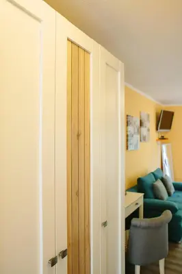 Ein Sitzbereich in der Unterkunft Gästehäuser Kappelmühle
