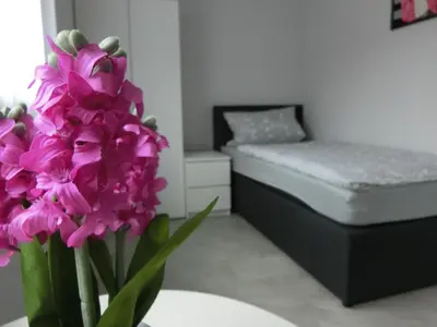 Ein Bett oder Betten in einem Zimmer der Unterkunft Zimmer Enzjan