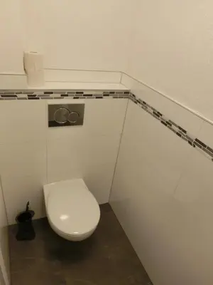 Ein Badezimmer in der Unterkunft Zimmer Enzjan