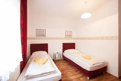Ein Bett oder Betten in einem Zimmer der Unterkunft Pension Jasmin