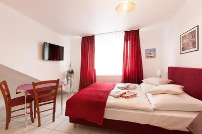 Ein Bett oder Betten in einem Zimmer der Unterkunft Pension Jasmin