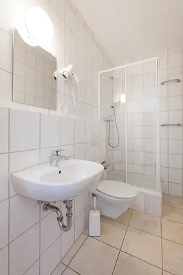 Ein Badezimmer in der Unterkunft Pension Jasmin