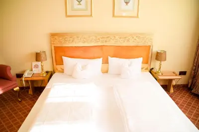 Ein Bett oder Betten in einem Zimmer der Unterkunft Walk'sches Haus