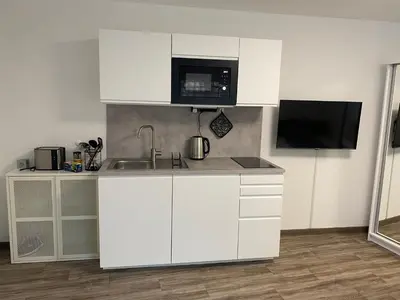 Küche/Küchenzeile in der Unterkunft Business-Apartment Braun
