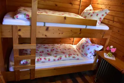 Ein Bett oder Betten in einem Zimmer der Unterkunft Ellernhof im Spessart