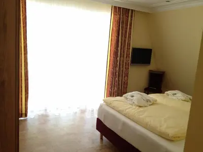 Ein Bett oder Betten in einem Zimmer der Unterkunft Wald-Hotel Heppe
