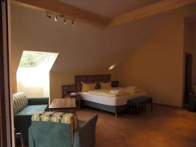 Ein Bett oder Betten in einem Zimmer der Unterkunft Wald-Hotel Heppe
