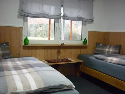 Ein Bett oder Betten in einem Zimmer der Unterkunft Haus am Sandsteinbruch