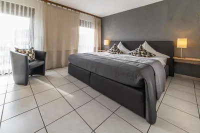 Ein Bett oder Betten in einem Zimmer der Unterkunft Hotel Landgasthaus Sockenbacher Hof