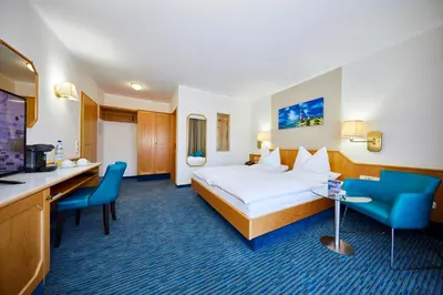 Ein Bett oder Betten in einem Zimmer der Unterkunft Sonnenhof