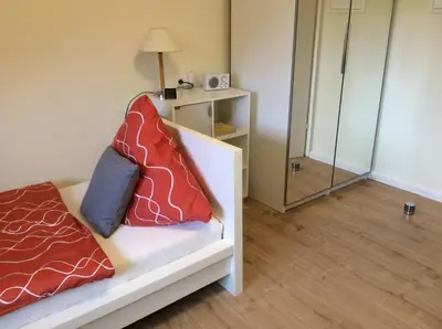 Ein Bett oder Betten in einem Zimmer der Unterkunft Heidelberg Appartements Berger